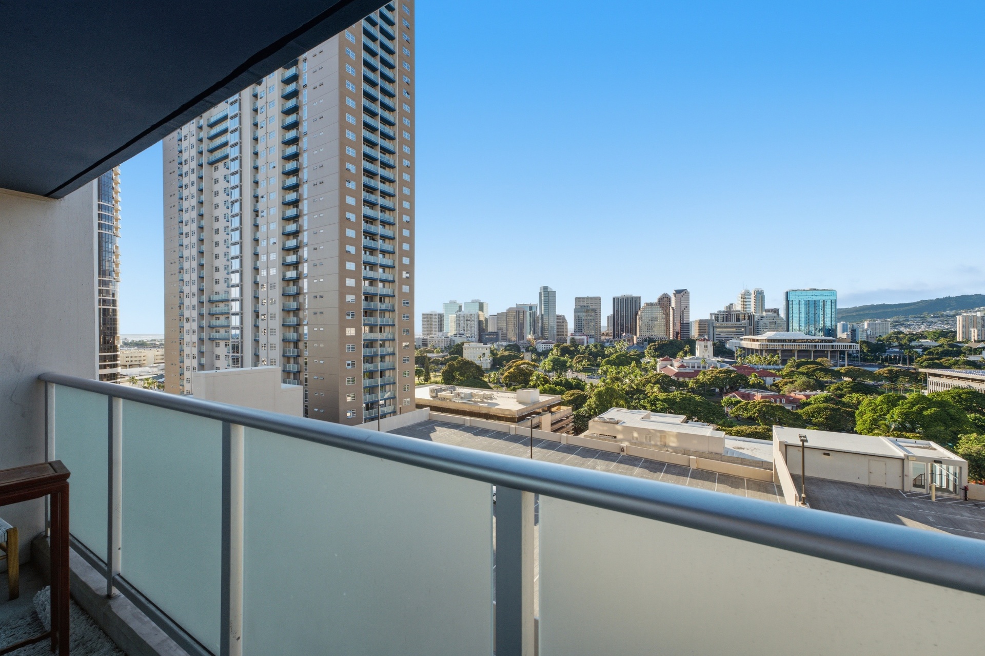 Lanai with view of neighboring high-rises and downtown skyline