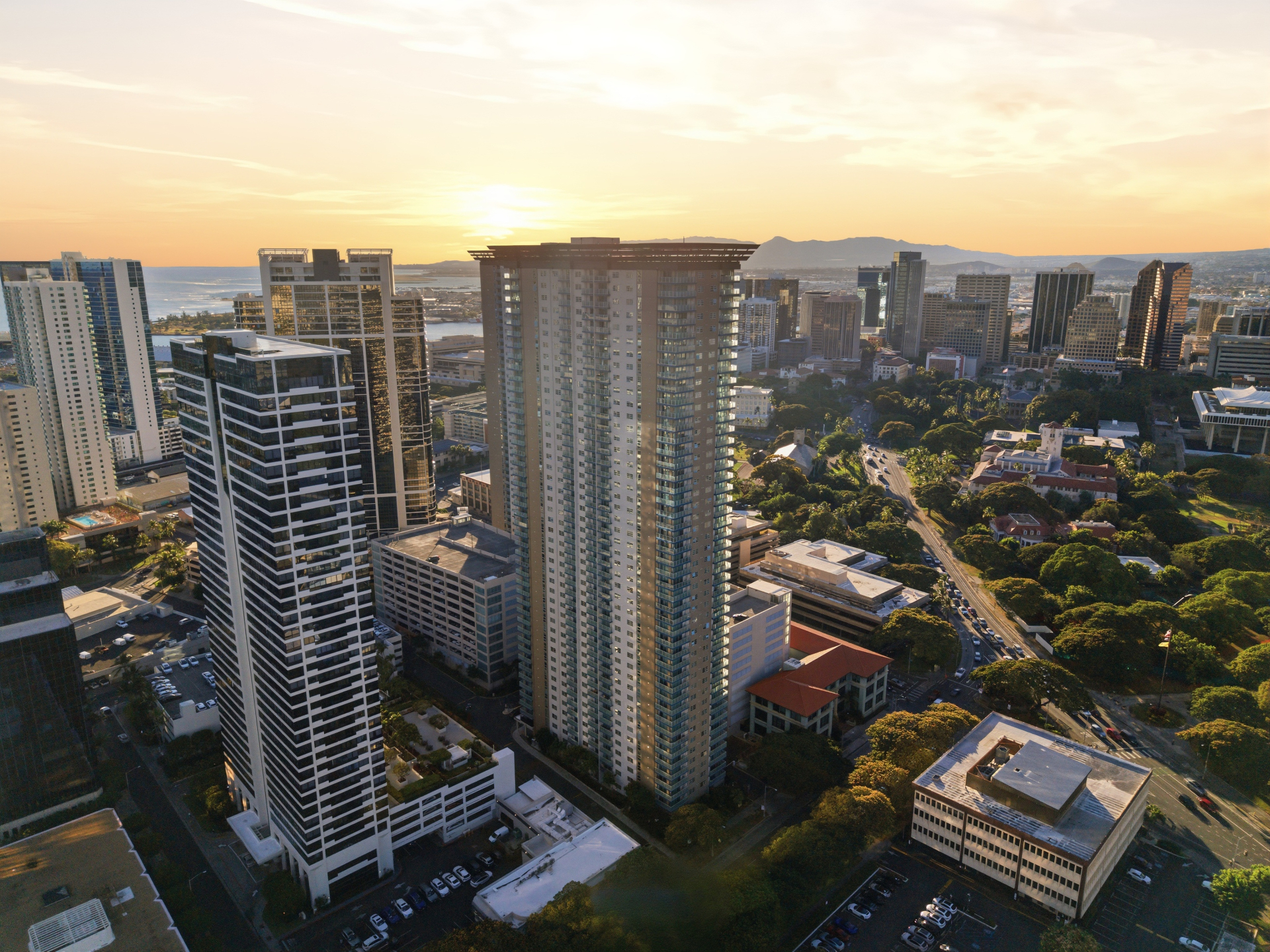 Aerial sunset view of 801 South St towers over Honolulu